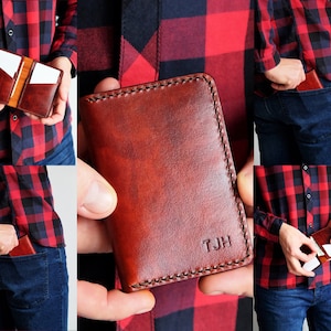 Cartera de cuero bifold delgado cosido a mano de un cuero de grano completo de alta calidad, perfecto para un bolsillo delantero.