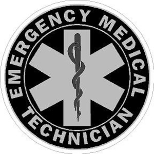 Puede incluir: Una pegatina redonda negra y plateada con el texto "Emergency Medical Technician" que rodea un símbolo médico estilizado con una serpiente enroscada alrededor de un bastón.