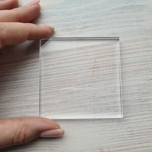 May include: A clear glass square, perfect for crafting or displaying small items.