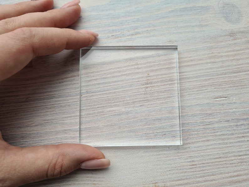 May include: A clear glass square, perfect for crafting or displaying small items.