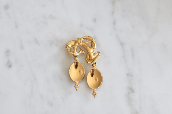 gold and rhinestone statement pin - image 2