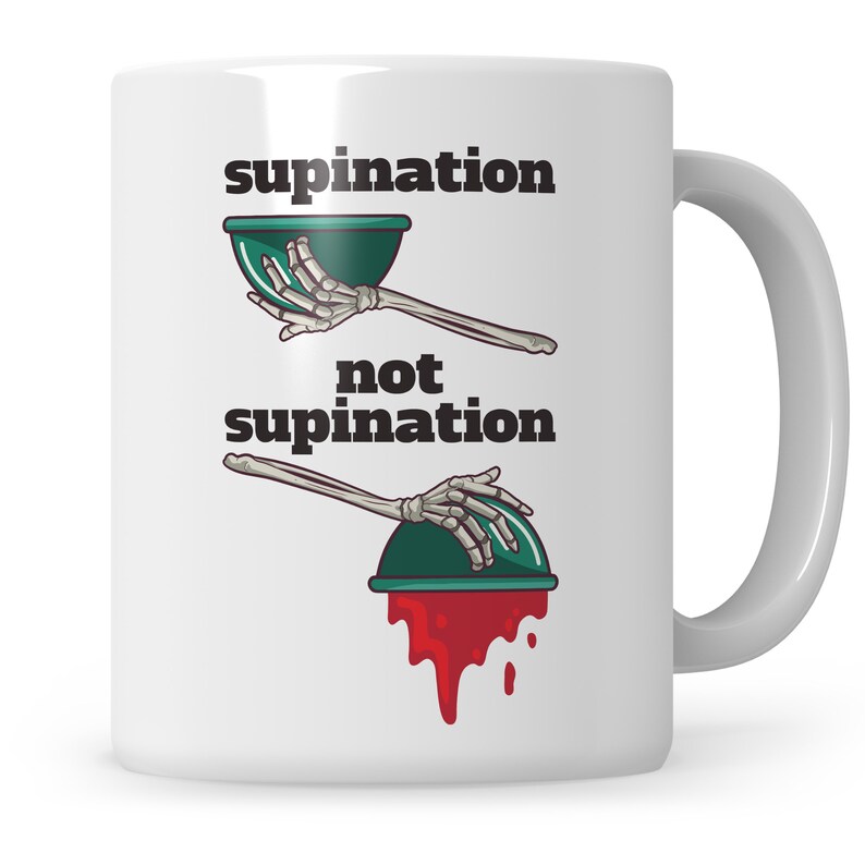 May include: White ceramic mug featuring a black and green illustration of a skeleton hand holding a bowl. The text "supination" is above the bowl and "not supination" is below the bowl. The bowl in the bottom illustration is dripping red.