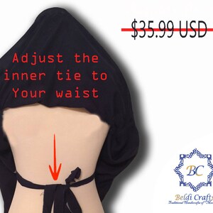 May include: Black hooded wrap with a tie that can be adjusted to fit your waist. The text "Adjust the inner tie to your waist" is printed on the wrap. The price is $35.99 USD.