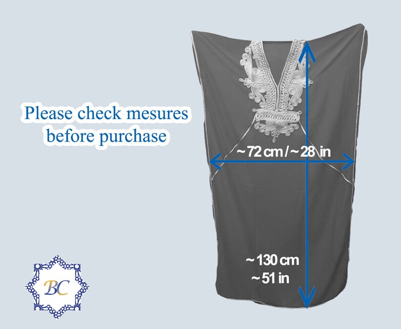 May include: A black, long-sleeved tunic with silver embroidery around the neckline. The tunic measures approximately 51 inches long and 28 inches wide.