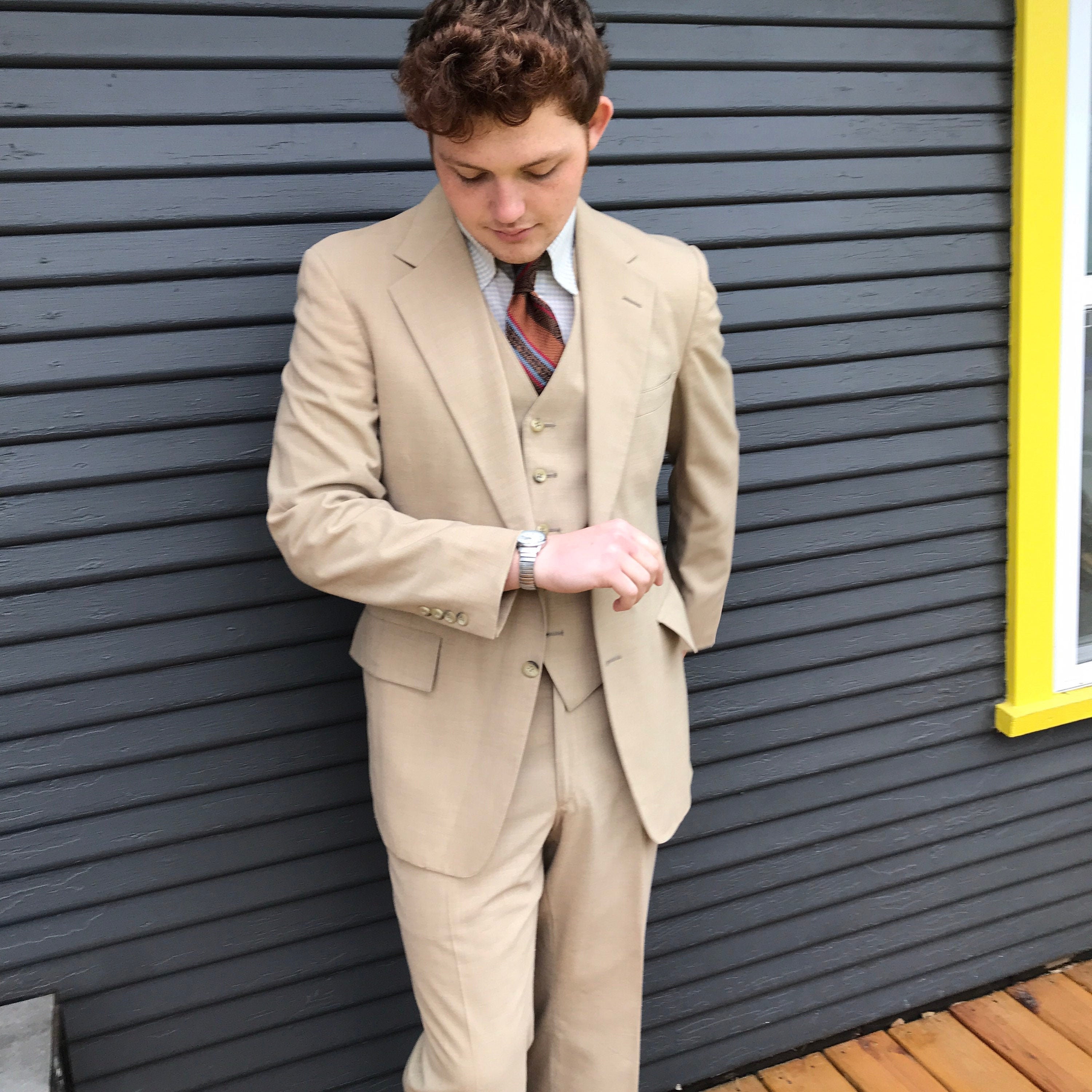 tan suit jacket