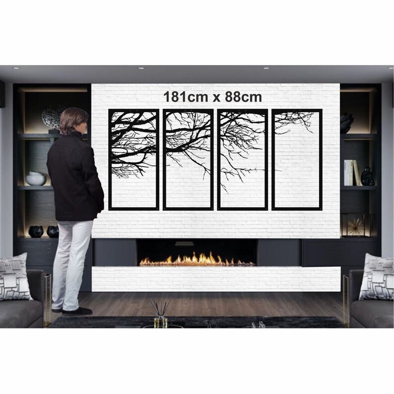 May include: A black metal wall art sculpture featuring four panels with a silhouette of tree branches. The sculpture is 181cm wide and 88cm tall. The sculpture is displayed on a white brick wall above a fireplace.
