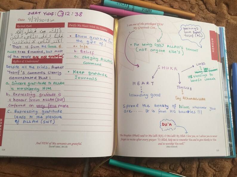 May include: Open notebook with handwritten notes and diagrams. The text includes Arabic script, English translations, and bullet points on gratitude and Islamic teachings. Colored pens highlight key points.