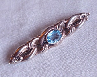 Art Nouveau brooch in 835 silver plated with rose gold and blue stone