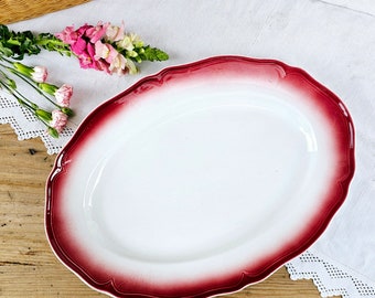 Badonviller | Oval serving dish with pink border, Théophile Fenal, ironstone