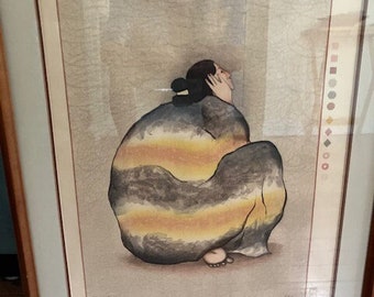 May include: A framed print of a woman in a striped, yellow, black, and gray robe, sitting with her head tilted back. The print is signed "T.C. Cannon 1988".