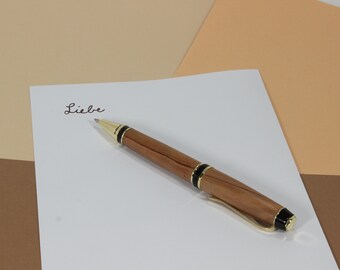 handmade executive ballpoint pen made of olive wood