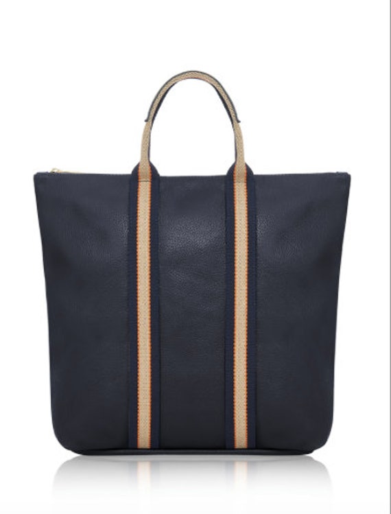 navy blue leather backpack