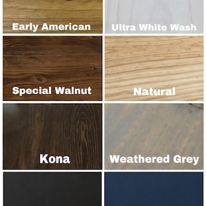May include: A collection of wood stain samples in various colors. The samples include Early American, Ultra White Wash, Special Walnut, Natural, Kona, Weathered Grey, Black, and Navy Blue, each labeled with its name.