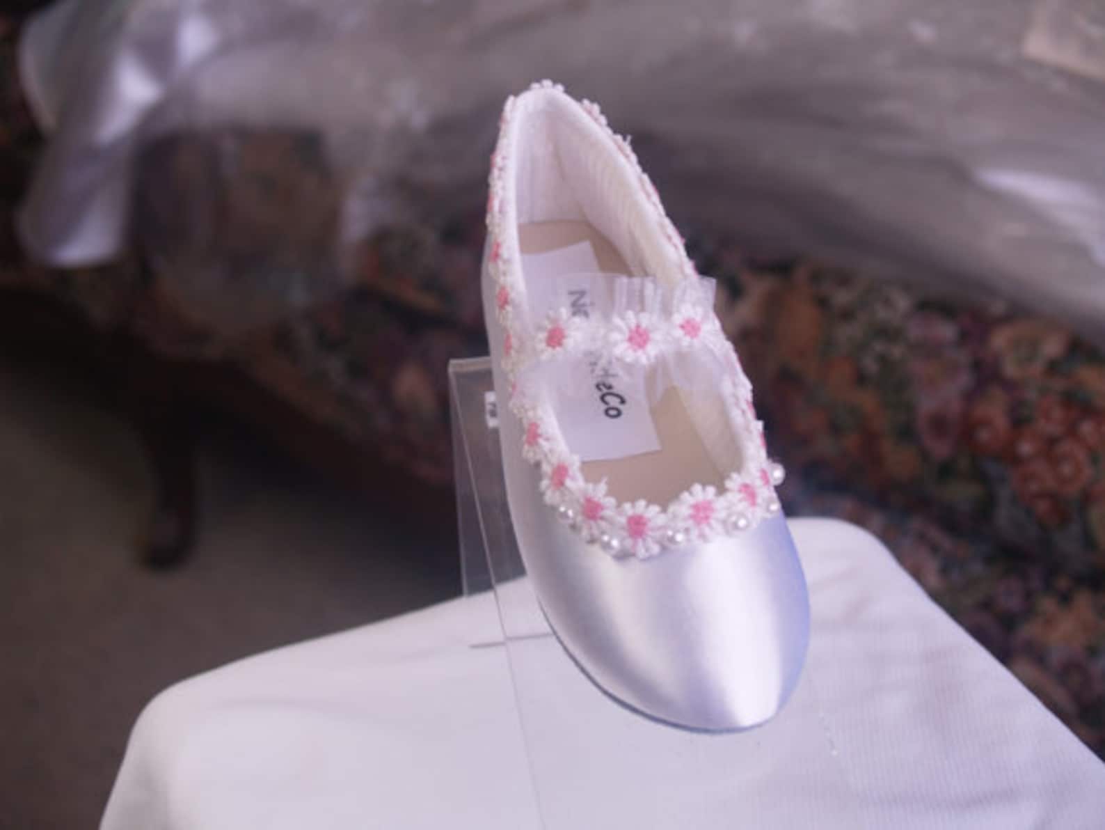 white pink girls shoes satin ballet style slipper, satin shoes with pink and white flower trim, mary jane style strap, pink and