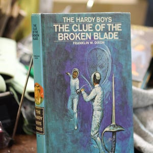 1970 The Hardy Boys #21 The Clue of the Broken Blade by Franklin W. Dixon