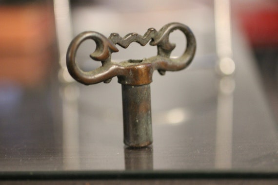 Antique Brass Clock Key: Ornate Handle, Hexagon Hole