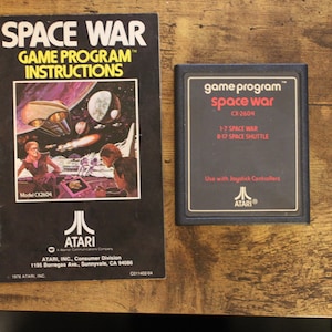 1978 Atari 2600 Space War - game cartridge - instructional manual - warranty registration card