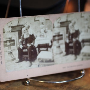 1897: Young Child With Her Grandfather - James M. Davis &B.W. Kilburn Stereoscope Viewer Card - Antique Victorian Photography