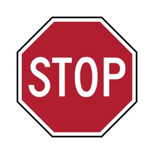 May include: A red octagonal stop sign with white lettering that reads "STOP".