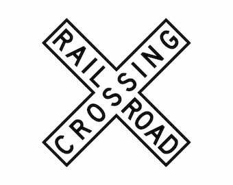 May include: Black and white graphic of a railway crossing sign with the text "RAILROAD CROSSING" in a bold, sans-serif font.