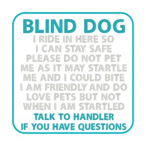 May include: A blue and white sign with the text "BLIND DOG" in large, bold letters. The sign reads: "I ride in here so I can stay safe. Please do not pet me as it may startle me and I could bite. I am friendly and do love pets but not when I am startled. Talk to handler if you have questions."