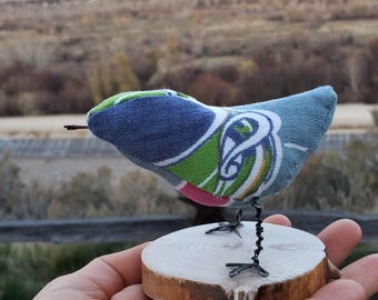 Little fabric bird figurines on wooden base, upcycled