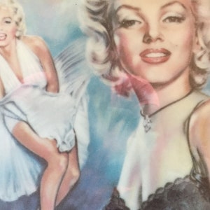 Marilyn Monroe photos, book, Delphi collectors plate with authenticity papers and binder of articles