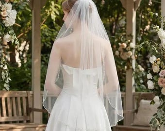 Veli da sposa fatti a mano, mantelline di perle e accessori da sposa personalizzati