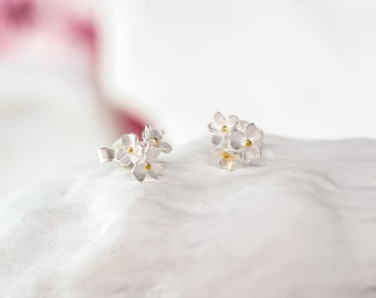 Dainty three Silver Flowers Stud Earrings with 18kt Gold plated centers.