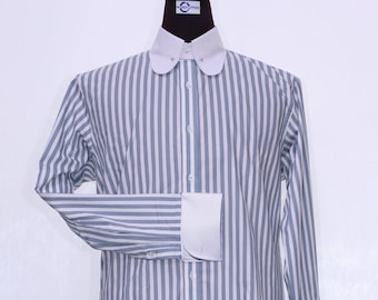 May include: A white and blue striped long-sleeve dress shirt with a white collar and cuffs. The collar has a pointed, wingtip design.