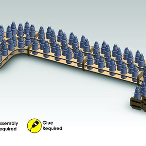 May include: A wooden display rack with multiple shelves, holding numerous blue cylindrical objects. The rack has a curved design and is made of light brown wood. Assembly and glue are required.