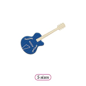 以下が含まれることがあります： クリーム色のネックと弦を持つ青いエレキギター。ギターは漫画風で、刺繍プロジェクトに最適です。