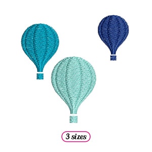 Op de afbeelding: Drie luchtballonnen in verschillende maten. Eén is blauw, één is turquoise en één is lichtblauw.
