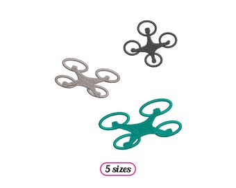 May include: Three embroidery designs of drones in different colors: gray, black, and teal. The text "5 sizes" is below the designs.
