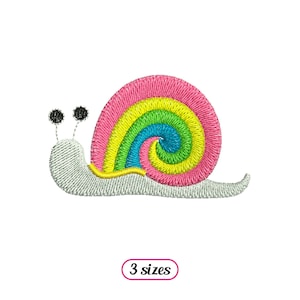 May include: Embroidered design of a rainbow snail with a pink shell and a white body. The snail has two black eyes.