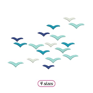 May include: A digital embroidery design featuring a flock of blue, teal, and white birds flying in a loose formation. The design is available in four sizes.