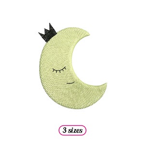 May include: Embroidered design of a crescent moon with closed eyes and a black crown. The moon is a pale yellow colour with a textured appearance. The text "3 sizes" is in a pink oval.