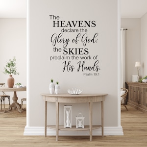 May include: A wall decal with a religious quote from Psalm 19:1. The quote reads "The Heavens declare the Glory of God: the Skies proclaim the work of His Hands."