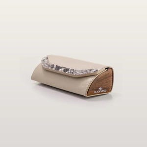 May include: A beige rectangular glasses case with a textured finish and a snakeskin pattern on the flap. The side panel is made of dark brown wood with the text BLACKWOOD and a small logo printed in white on the wooden surface.