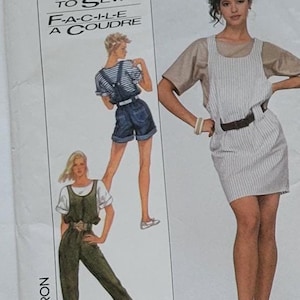 May include: Simplicity sewing patterns featuring overalls, shorts, and a dress. The patterns include illustrations of the finished garments and the text "E-A-S-Y TO SEW". The image shows the front and back of the pattern, with the number 849.