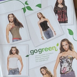 May include: A sewing pattern for a corset, Simplicity pattern number 2966. The pattern includes instructions for making a variety of styles, including a strapless corset, a corset with straps, and a corset with a lace-up back. The pattern also includes a "go green" message encouraging sewers to use recycled materials.