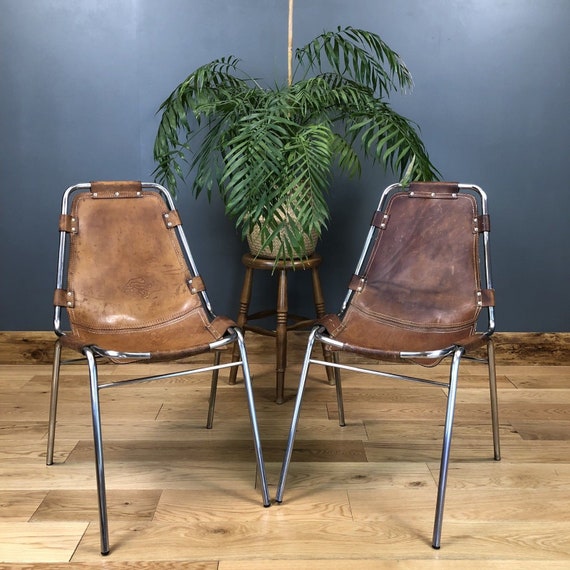 Pair Of Mid Century Charlotte Perriand Les Arcs Chairs Leather Chrome Seating