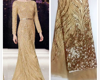 2021 Tela de encaje africano de alta calidad Red de tela de encaje francés Tul con tela de encaje nigeriano de oro de lentejuelas para bodas J1036