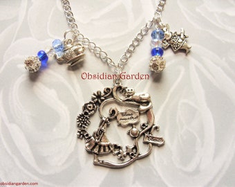 Blue Alice in Wonderland pendant and charm necklace