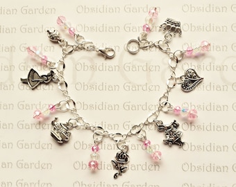 Pink Alice in Wonderland themed charm bracelet