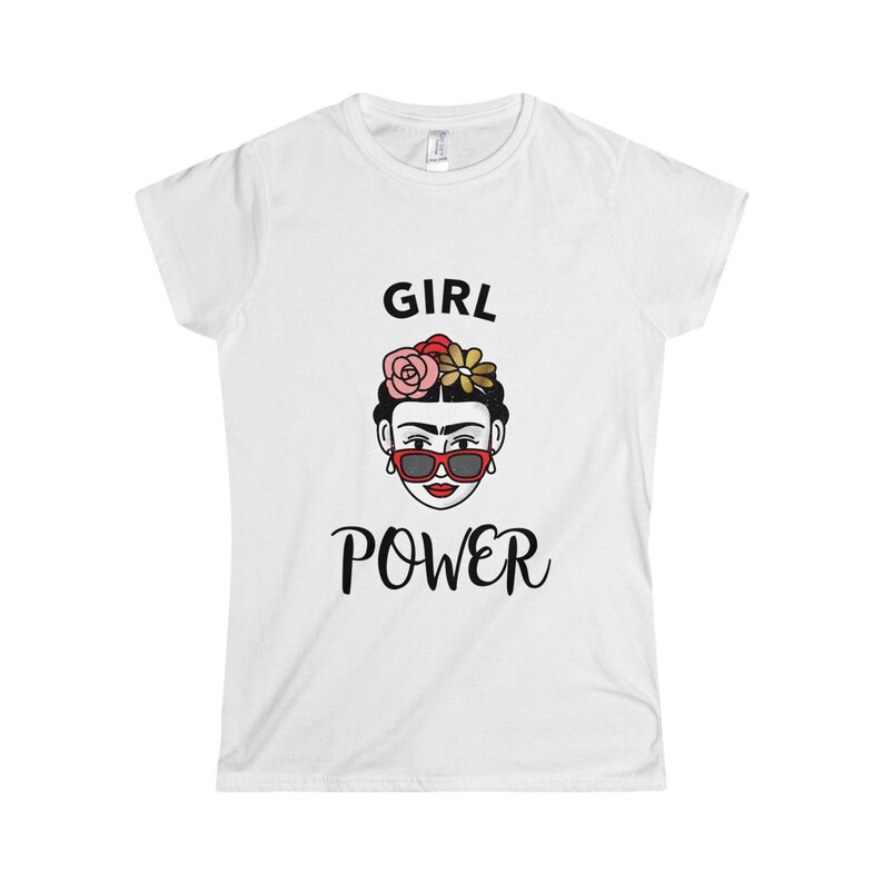 May include: White t-shirt with a black graphic of a woman with flowers in her hair and sunglasses. The text "GIRL POWER" is printed below the image.