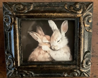 Hand-Painted Miniature  of Bunnies on a 2.5”x3” on a  canvas print , bonded to canvas  . Antiqued Resin Frame, Ready to Hang