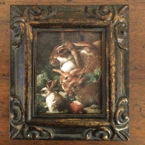 HAND PAINTED MINIATURE  of a bunny family on a  2.5x3” canvas print , placed in an antiqued resin frame.