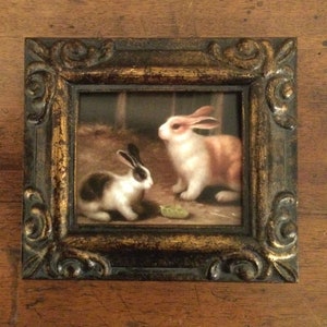 HAND PAINTED MINIATURE on a 2.5” x 3” canvas print of oil of rabbits /Framed