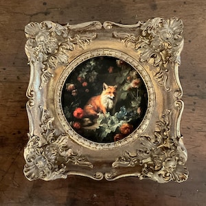 HAND PAINTED MINIATURE  of a fox on a 2.5” canvas print and placed in a heavy gold frame, ready to hang .